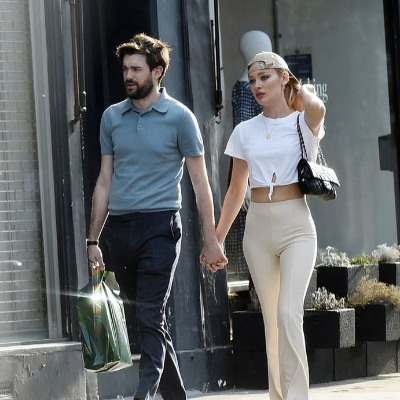 Jack Whitehall and Roxy Horner strolling around in London.